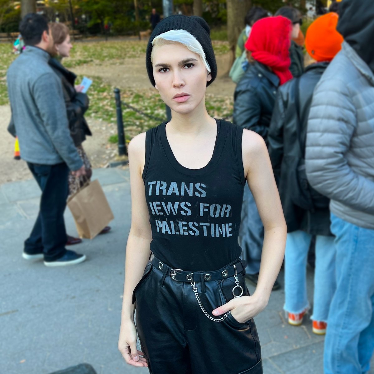 EliErlick's tweet photo. Zionists shouted "fucking f-ggots" and "perverts" at us during Sunday's queers for Palestine march. Yet they want us to believe they support us? It's the perfect metaphor: a few Zionists can yell from luxury condos and have a disproportionate voice over the thousands below them. https://t.co/ukxVETsQba