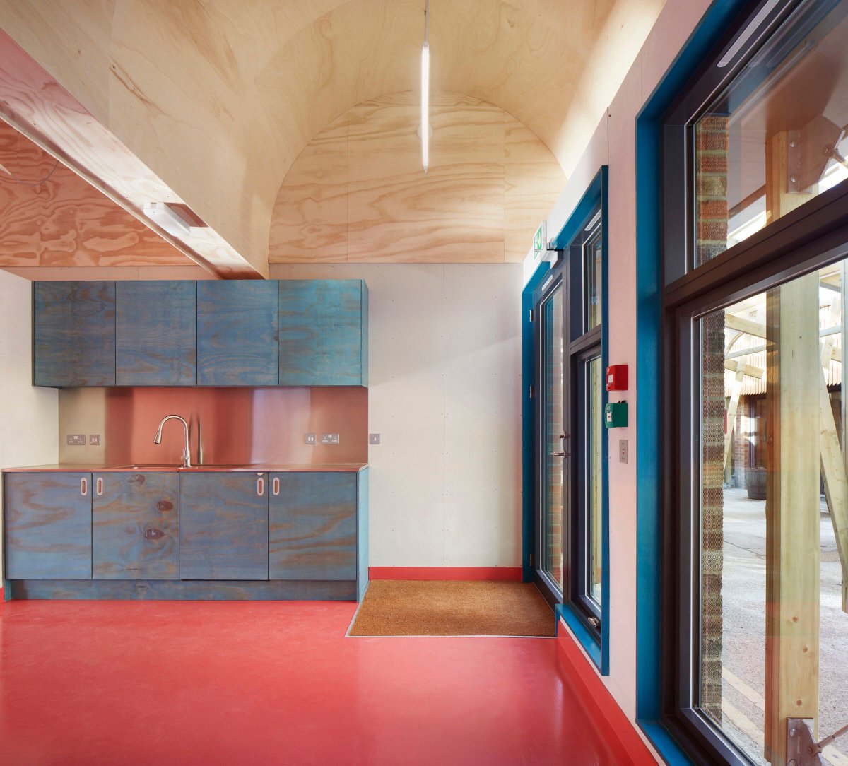 Jan Kattein Architects transforms derelict garages into affordable workspaces buff.ly/46dX4oG Photo: Jack Hobhouse