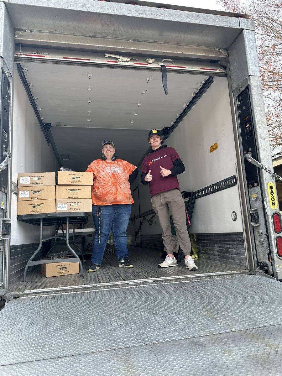 A beautiful day for serving the community at <a href="/FeedingSWVA/">Feeding Southwest Virginia</a>’s Mobile Marketplace! <a href="/HokiesFB/">Virginia Tech Football</a>’s Kyle Lowe, Chance Fitzgerald, and Pop Watson helped shoppers and chatted with @warmhearthvillage residents. #UtProsim #Hokies