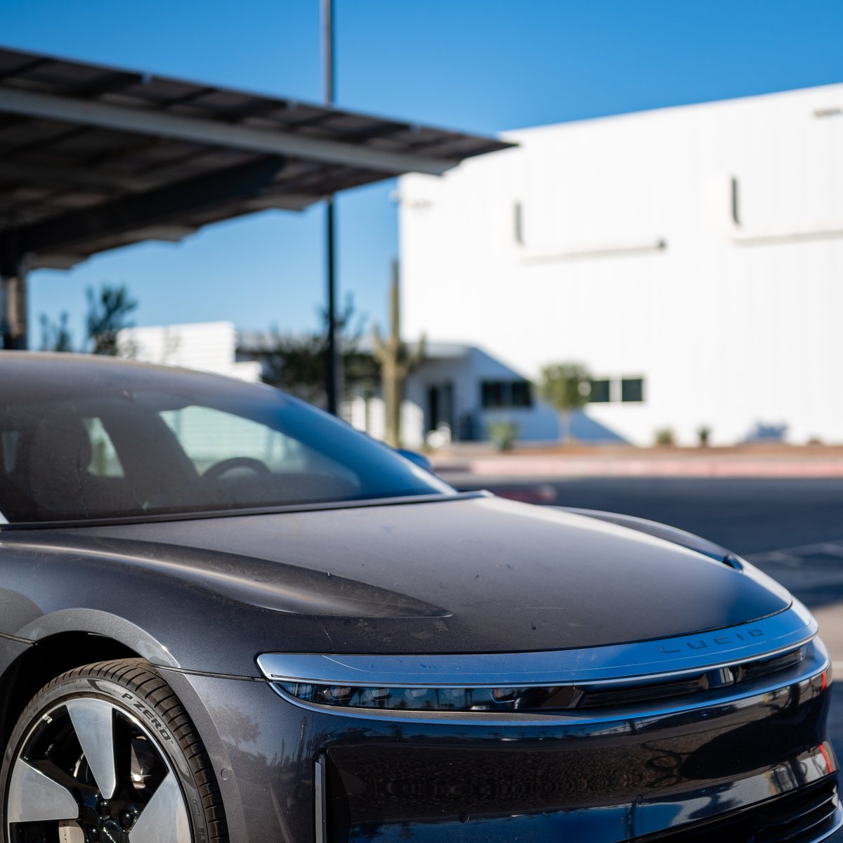 DavidGanske's tweet photo. As any energy nerd will attest, a road trip should include visits to iconic energy infrastructure. Last weekend, I visited the @LucidMotors “AMP-1” #ev production plant located in Casa Grande, about an hour drive south of Phoenix. #lucidmotors #lucidair #electricvehicle https://t.co/g9POn8zcEP