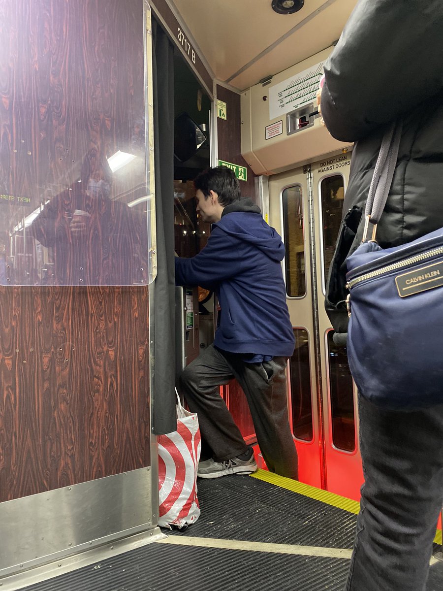 DenzilMohammed's tweet photo. Hi @MBTA. This is a regular occurrence with this guy. He stands where he shouldn’t for the entire ride talking and laughing with the trolley operator. Is this okay? Heath St E train 3717 around 7:15 pm today. https://t.co/DbqCNVstpy