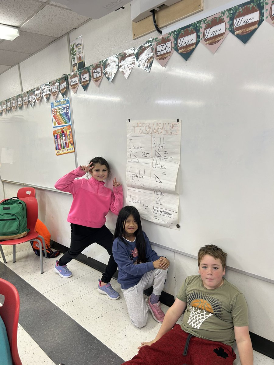 4/5s demonstrated serious #collaboration today creating and presenting anchor charts on what they’ve learned about rectangles and triangles! A great review activity while learning how to work together ✔️✔️

#ocsbDL
#beSKT 
<a href="/StKateriOCSB/">St. Kateri Tekakwitha School</a>