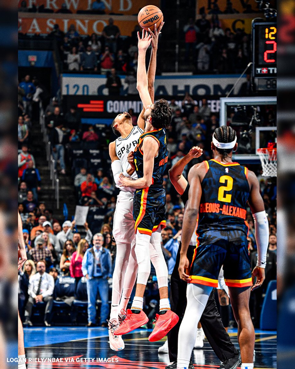 SportsCenter's tweet image. What a photo of Wemby and Chet's jumpball 😳 

📸: Logan Riely/NBAE via Getty Images