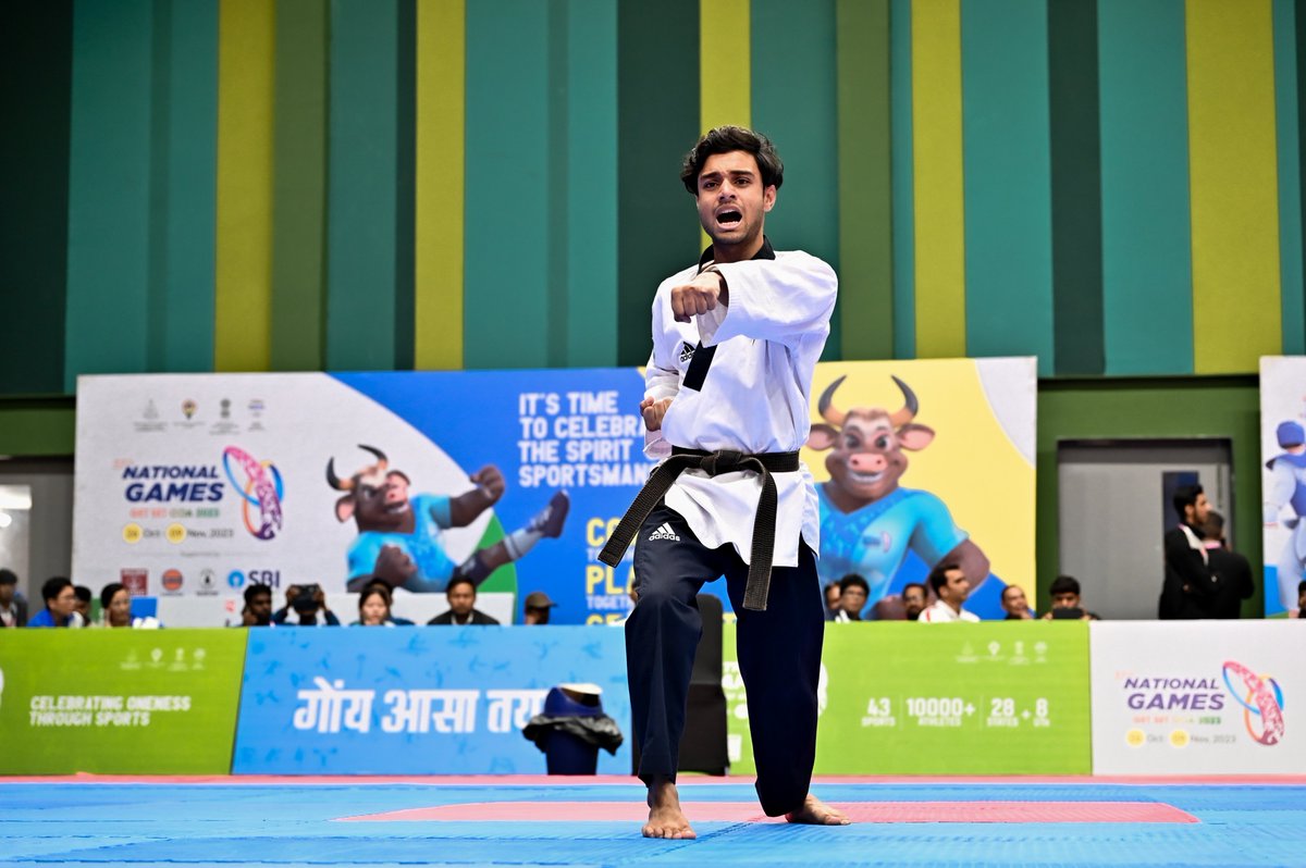 Nat_Games_Goa's tweet photo. Unleashing kicks and clinching victories — each move told a story of determination at the #37thNationalGames Taekwondo arena!

#GetSetGoa #NationalGamesGoa2023 

@DrPramodPSawant @Govind_Gaude @WeAreTeamIndia @tsagofficial @IndiaSports @PIB_India @PIB_Panaji @dip_goa https://t.co/DokLKSR09m