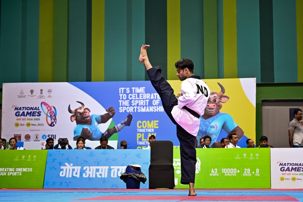 Nat_Games_Goa's tweet photo. Unleashing kicks and clinching victories — each move told a story of determination at the #37thNationalGames Taekwondo arena!

#GetSetGoa #NationalGamesGoa2023 

@DrPramodPSawant @Govind_Gaude @WeAreTeamIndia @tsagofficial @IndiaSports @PIB_India @PIB_Panaji @dip_goa https://t.co/DokLKSR09m