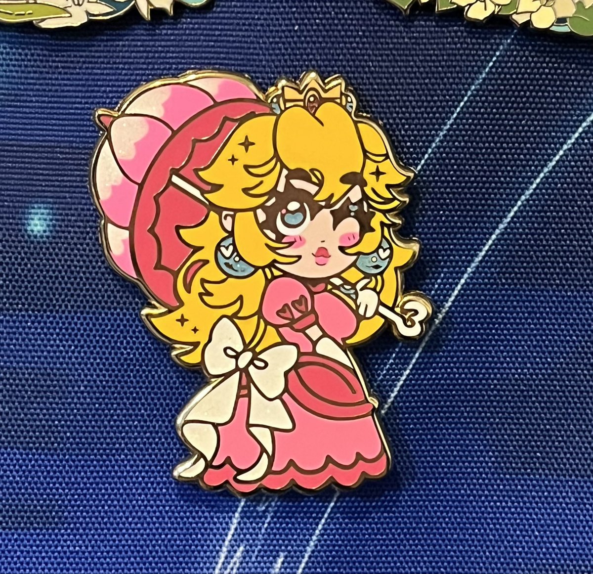 THE PINS I DESIGNED CAME this isn't the best photo but she's so CUTE!!
#PrincessPeach #enamelpin