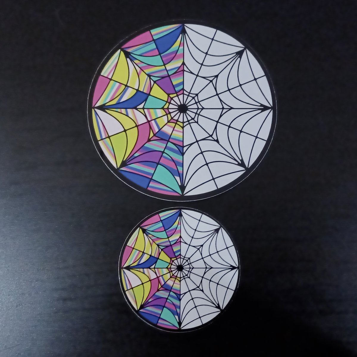 TapixT_'s tweet image. a particular favorite of my designs are from Wednesday! I have a combo keychain set of Wenclair, as well as window stickers and earrings (both partially transparent!) 

#Wednesdaynetflix #wenclair #wednesdaywindow #gothic #stainedglass #theaddamsfamily #wednesdayaddams