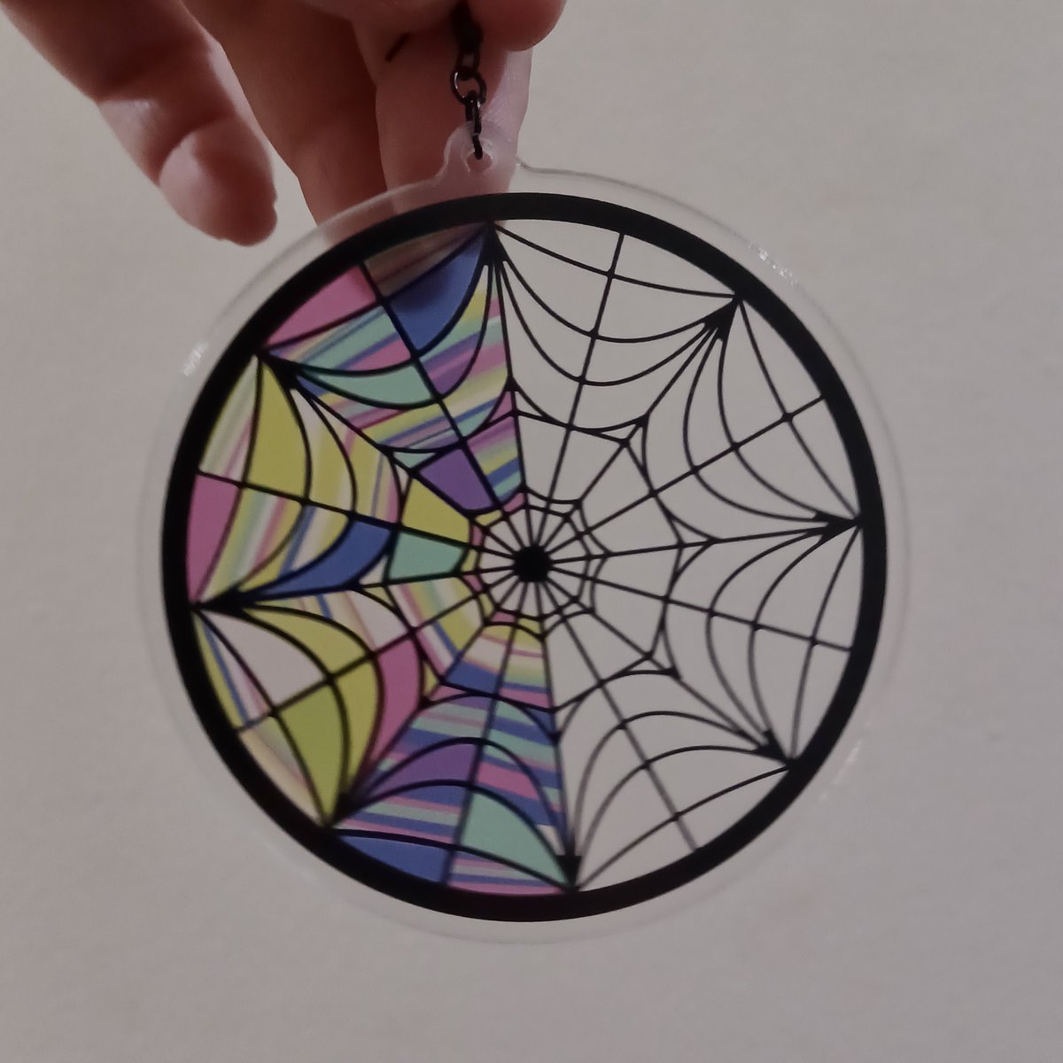 TapixT_'s tweet image. a particular favorite of my designs are from Wednesday! I have a combo keychain set of Wenclair, as well as window stickers and earrings (both partially transparent!) 

#Wednesdaynetflix #wenclair #wednesdaywindow #gothic #stainedglass #theaddamsfamily #wednesdayaddams