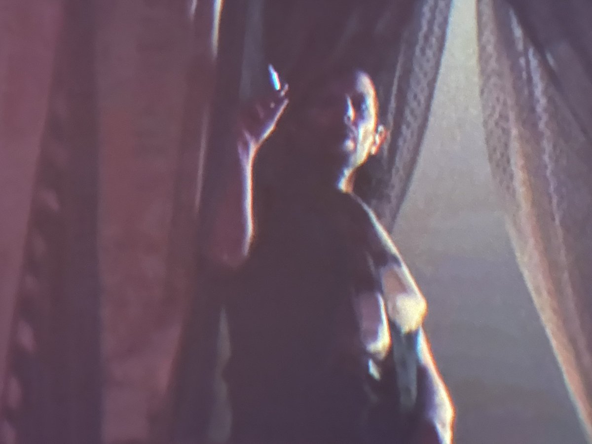 LauriLinnea's tweet image. Trying to figure out why this guy appears briefly in  #Nun2 just before the newsstand flipping scene. Can’t tell what he’s showing out the window and how he is dressed. #MutantFam