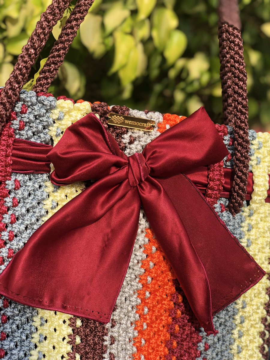 wemocraft's tweet photo. When in doubt put a Bow on it! 
Wemocraft. Knots 🪢 and kolors 🌈
Wear More Craft. 
Available on pre order. 
#handwoven #wearmorecraft #madeingh #bag https://t.co/4zjk8zI31j