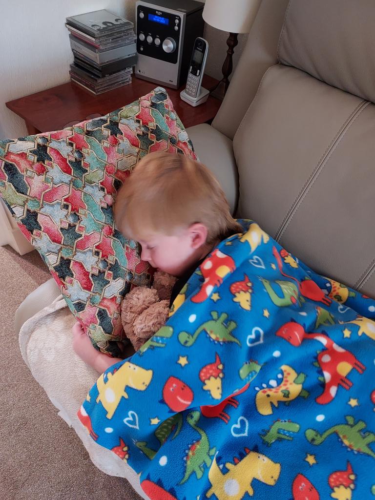 The rarest of rare events, wee Archie having a kip on the couch.
