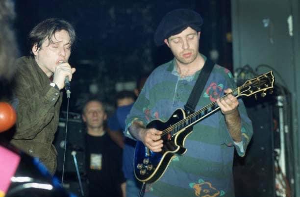 ShaunryderX's tweet photo. #WBW Shaun Ryder and Mark Day performing with Happy Mondays in Belgium in 1991 🎙️🎸
.
📷: Gie Knaeps/Getty Images
.
#HappyMondays #ShaunRyder #MarkDay #Archivephoto #WayBackWednesday @markday14 https://t.co/MPX03zB6dl