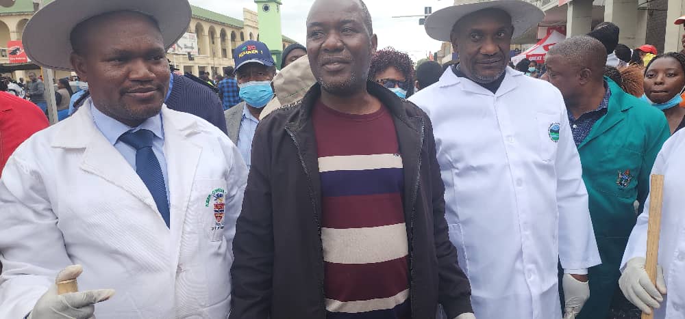 Leading by example: The Mayor of Gweru, His Worship, Cllr Chivhoko , Minister of State and Devolution, Mr Owen Mudha Ncube and ZCA Gweru district Coordinator, Pastor Makore participating in the clean up campaign in Gweru. @revuseni @GweruCityPR @ChurchesOn @DanChurchAidZW