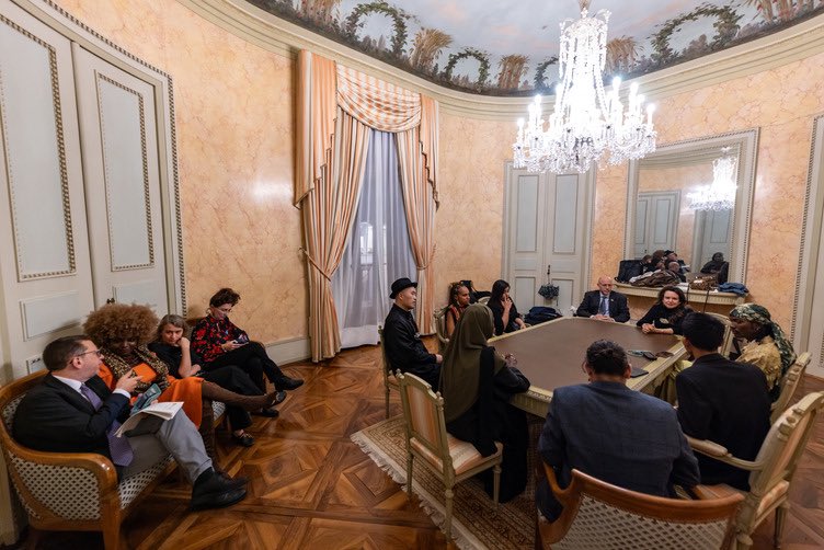 Accepting an award for the International Art Contest for Minority Artists Working on Intersectionality Themes, hosted by The United Nations Human Rights Office of the High Commissioner and the Minority Rights Group International in the Palais Anna et Jean-Gabriel Eynard.