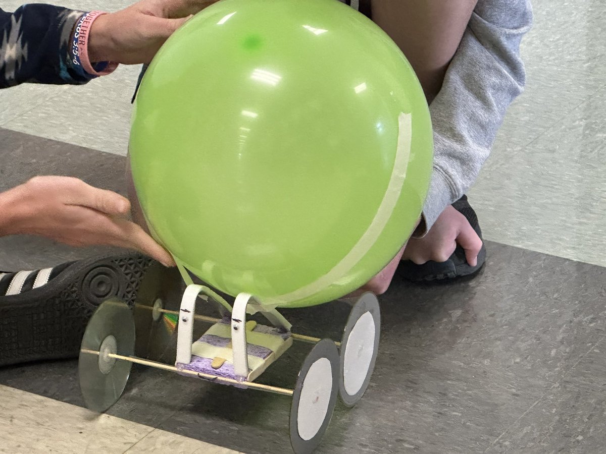 The winning balloon car went 122 feet!  Best in 3 years!!  It was fun to watch and I forgot to record it!