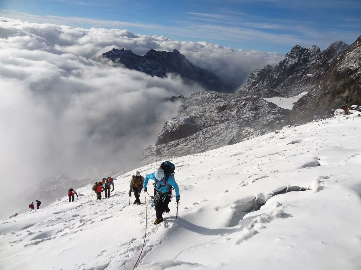 Experience the wonders of Rwenzori Mountains this weekend - an epic trekking destination with stunning vistas, lush forests, and high peaks. #MountainEscape #UgandaHiking #LifeOnOurPlanet