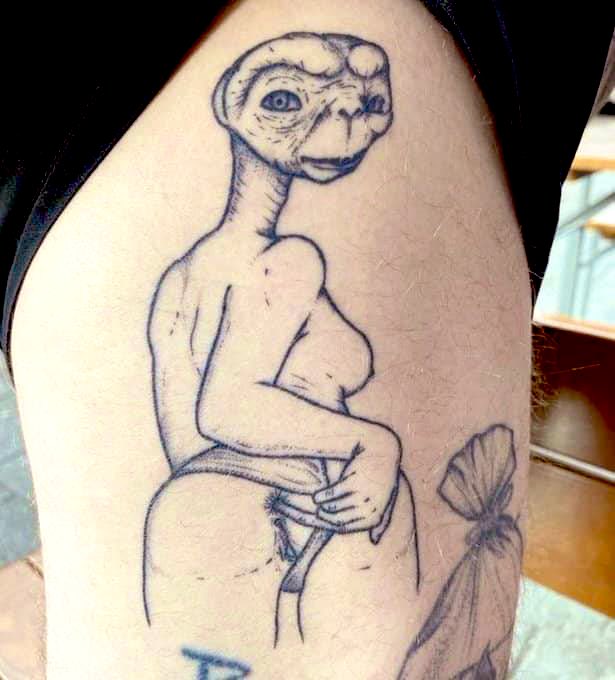 TwitForTatts's tweet photo. Sorry if you've already seen a tattoo of E.T. with tits pulling their knickers to the side and shoving a finger up their arse today but here it is again https://t.co/gPuk50ihdH