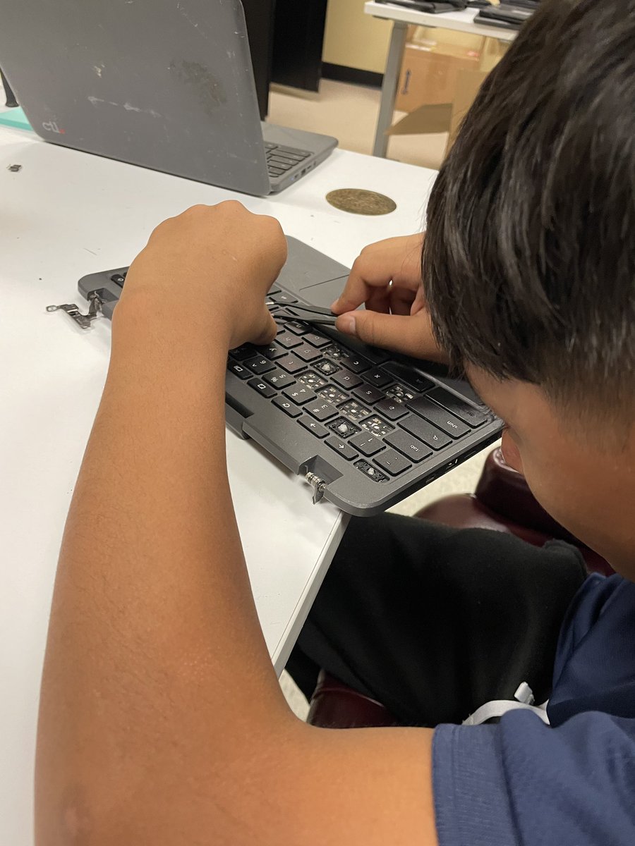 Todd Rigney, AI Prof. Development Coordinator (@todd_rigney) on Twitter photo User Device Technician, Mr. Sifuentes, shows two #DeviceManagementCommittee members at <a href="/MMAFAHISD/">Marshall Middle School</a> how to repair damaged keyboards on student <a href="/dpvils/">Verizon Innovative Learning Schools</a> Chromebooks with some practice and skill acquisition! We ❤️ 👀students learn valuable tech skills for their future! User Device Technician, Mr. Sifuentes, shows two #DeviceManagementCommittee members at <a href="/MMAFAHISD/">Marshall Middle School</a> how to repair damaged keyboards on student <a href="/dpvils/">Verizon Innovative Learning Schools</a> Chromebooks with some practice and skill acquisition! We ❤️ 👀students learn valuable tech skills for their future!