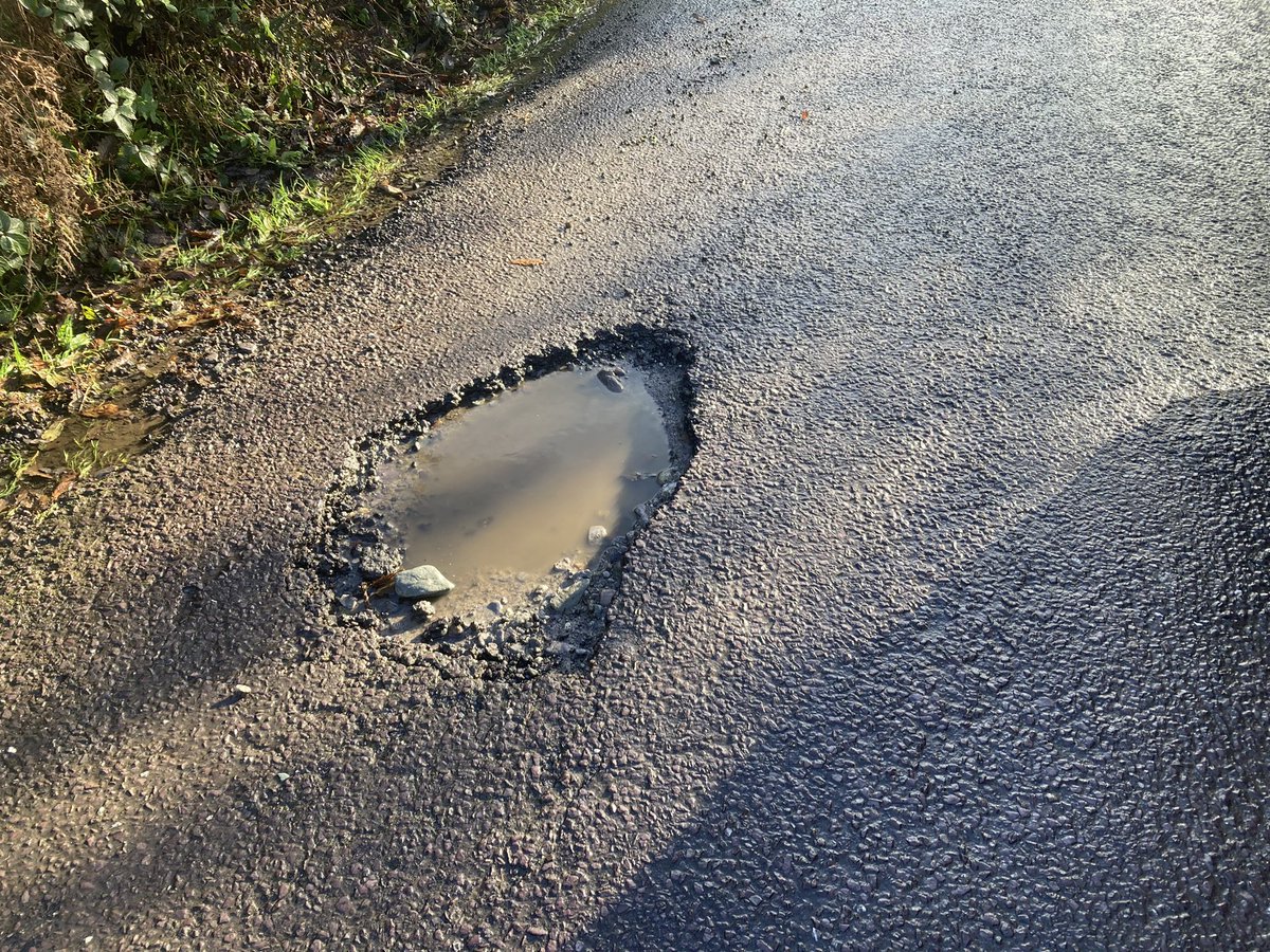 kieranomahony's tweet photo. This little beaut up from Murragh on Newcestown road cost me €80, surprised it didn’t wreck the wheel, and i wasn’t the first to hit it l!#pothole #westcork #driversbeware @CorkSafetyAlert @Corkcoco @SouthernStarIRL https://t.co/kH5ok32myx