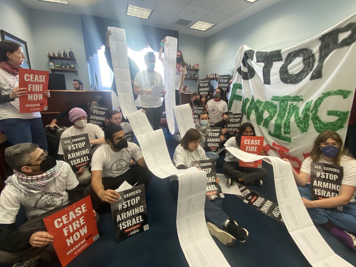 Demonstrators at Bernie Sanders office reading the names of the Palestinians massacred by the Israeli state, telling stories about their lives and demanding a ceasefire now in Gaza