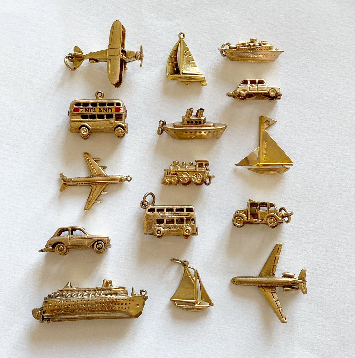 Lanesantiques's tweet photo. Gold transport charms in stock #goldcharms https://t.co/AHIFATQWRo