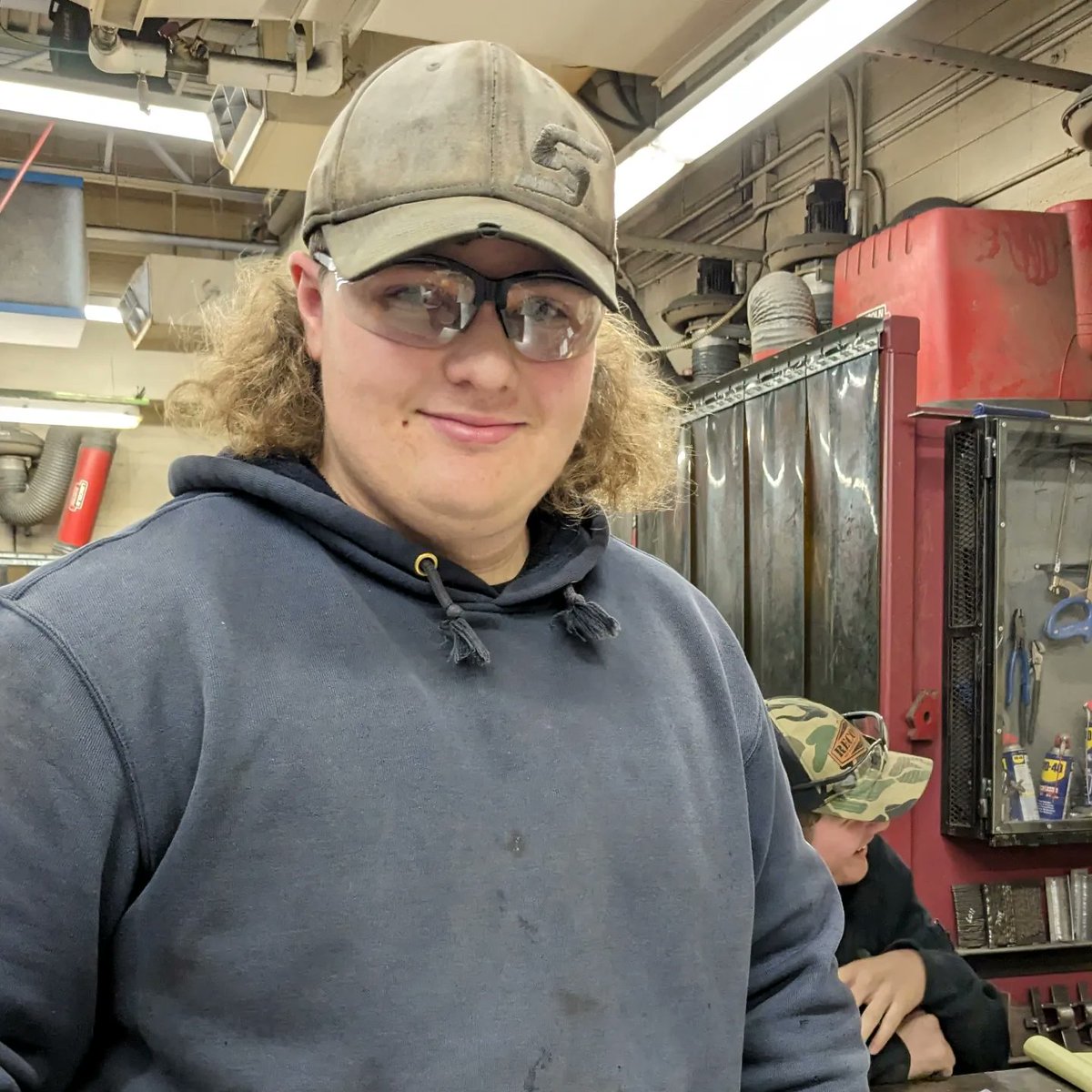 STC_VT's tweet photo. Hunter, jr Poultney HS, is happily working on a sheet metal fabrication project. He, along with his classmates are making charcoal chimney starters. #STCVT #VTCTE @VTEducation @jdebonis12 https://t.co/snnoIEIQ7V