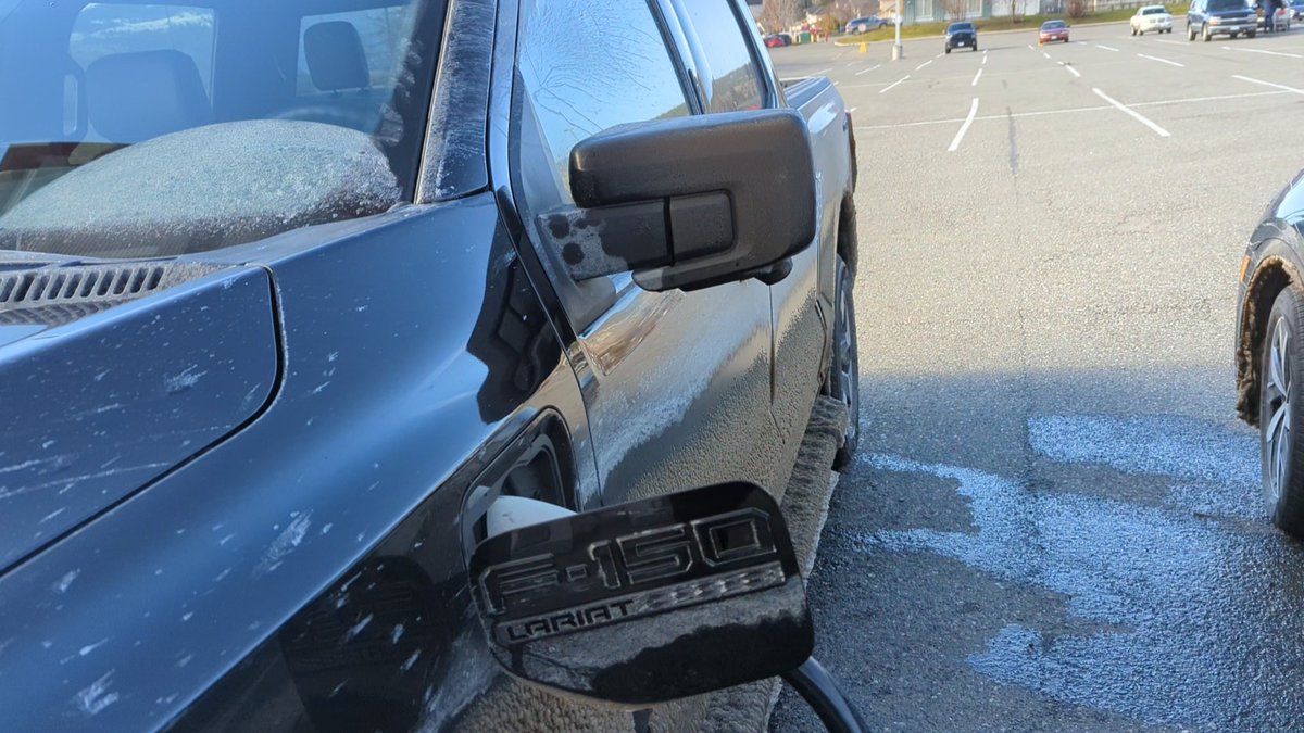 MichaelStanyer's tweet photo. Glazed with grime and ice but otherwise smooth sailing up to Merritt. Charging at Electrify Canada. https://t.co/Qd1gOeBM7F