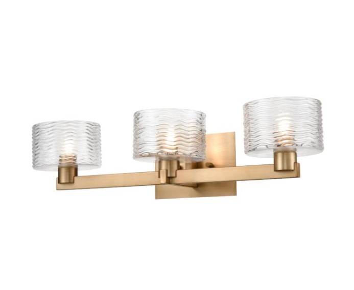 The Percussion collection primarily exhibits rippled glass shades and emphasizes on the visual design elements of water flow texture creating an exquisite and dispersed lighting effect. This affordable Vanity Light is available in Brass or Chrome. #sundiallighting #vanitylight