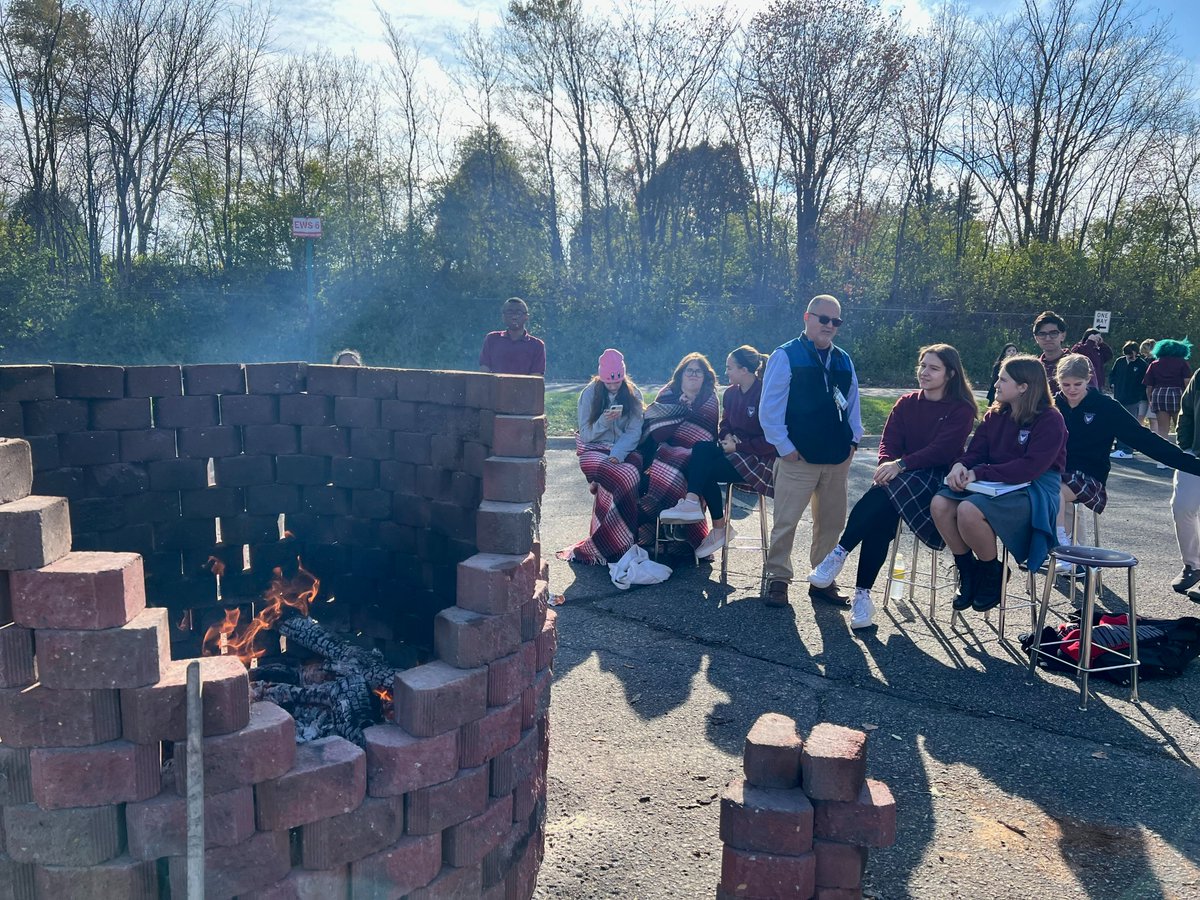 This afternoon, the ERA Art Department held their 15th Annual Pit Fire in the parking lot. Each fall, Upper school students currently enrolled in an Eagle Ridge Academy art class create a clay piece to be fired in the outdoor pit fire. #GoGryphons #ClassicalEducation