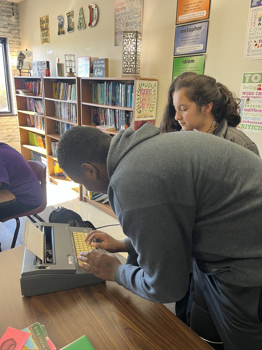 julz66's tweet image. My students are checking out how a typewriter works after finishing the novel “The Outsiders”.  They are impressed that S.E. Hinton wrote the novel without a computer 🖥️  @DeLayMS