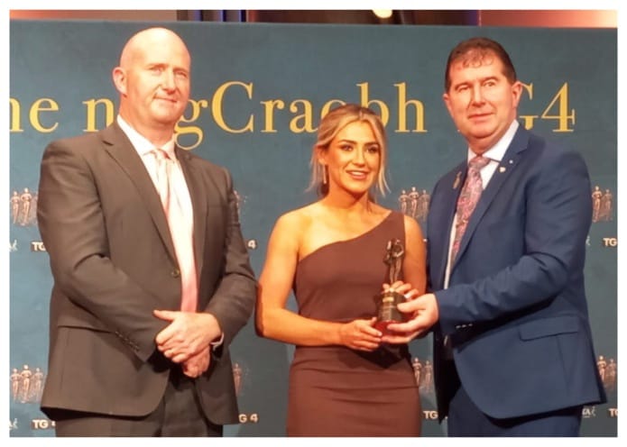 MonageaLGFC's tweet photo. Congratulations to Monagea's Yvonne Lee, Grace Lee, Deborah Murphy &amp; Karen O’Leary who were each presented with their TG4 Junior Football Team of the Championship Awards tonight by LGFA President Micheàl Naughton &amp; Head of Sport at TG4 Rònàn Ò Coisdealbha. Fantastic achievement. https://t.co/hDSGKhnkTx