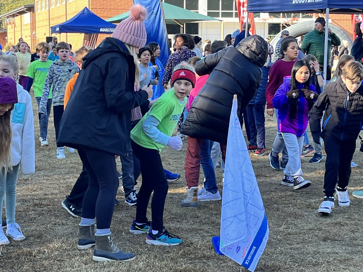 ashlee_ciccone's tweet photo. We took a risk, moved our fun run to the fall, and nailed it! So grateful to @PinehurstPTA & @boosterfunrun for helping us raise money with joy for a decade! Our families “Stand Tall”in supporting every effort💙 #RelentlessPES #goalcrushed https://t.co/Dz59u1onlL