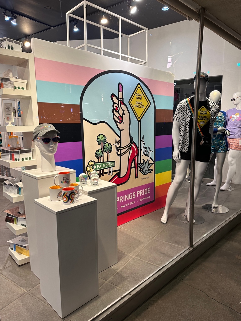 Destination_PSP's tweet photo. Pride window in place!  Featuring the artwork of Trevor Wayne who designed this year's poster! 🌈✨ 

Celebrate history, progress, and love at Destination PSP for Palm Springs Pride. 🌈❤️ #PalmSpringsPride #LGBTQ+  #trevorwayne #palmspringspride https://t.co/xYD0mWHtKA https://t.co/dS9UKFKbVx