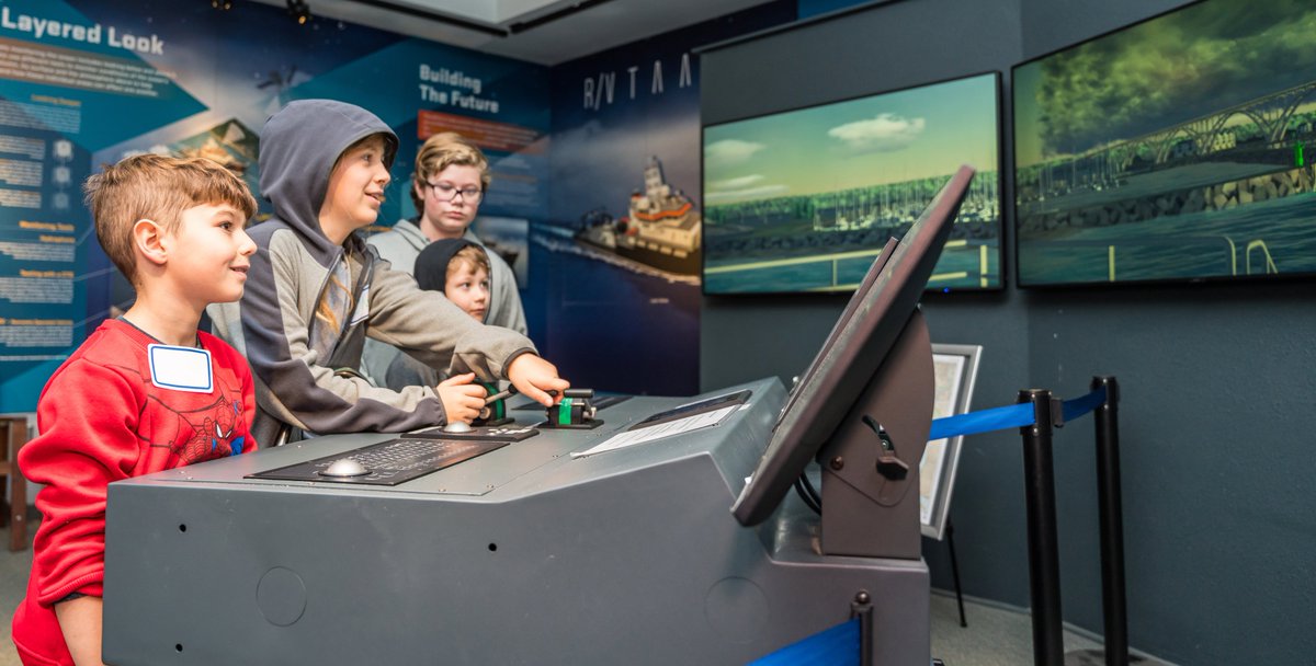 Families in our homeschool day this week explored our Visitor Center <a href="/HatfieldMSC/">OSU Hatfield</a>. They steered a simulated research ship through a virtual Yaquina Bay, touched sea urchins in the indoor tide pool &amp; learned about topography in the interactive sandbox.