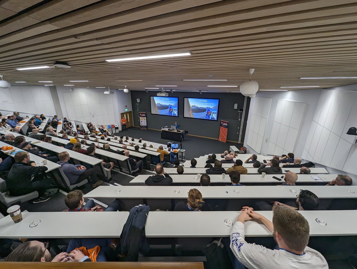 And we are off. <a href="/LisaForteUK/">Lisa Forte</a> is delivering her keynote to a packed room at BSides Bristol.