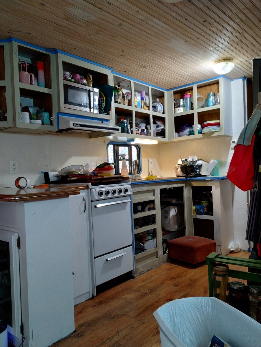pinkydmd's tweet photo. If you want to know how disorganized your kitchen is? Take the cabinet doors off. painting the #tinytrailer .. https://t.co/oKRHKiiHQQ