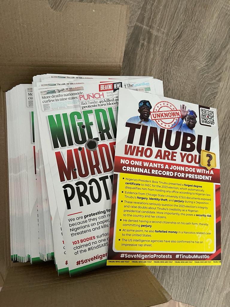 General_Oluchi's tweet photo. BATidiots could not afford fliers and banners so they went there to sing, but guess whose banners will overshadow the protest? It looks like BATidiots are back up singers for Well-Meaning Nigerians. 🤣🤣🤣😂😂

Well-Meaning Nigerians handed out too! 
 
No MC Oluomo or Ben Hundeyin to tag. This is LONDON.