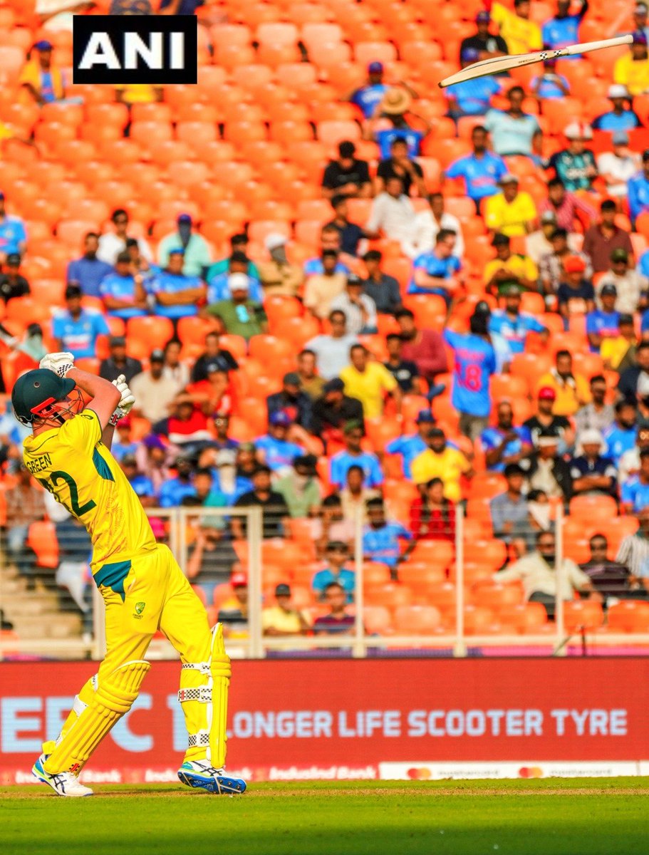 ANI's tweet photo. Australia's Cameron Green loses his bat while playing a shot today during the match against England in the ICC Men's Cricket World Cup 2023, at Narendra Modi Stadium, in Ahmedabad.

(Picture Source: ANI Photos) https://t.co/RafvAbCir2