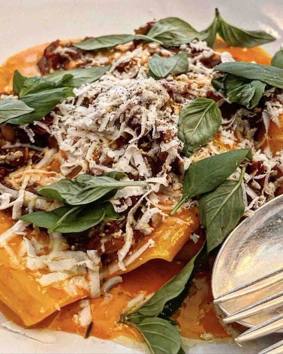 Pappardelle with roasted red pepper, spiced tomato sofrito, ricotta salata and basil.