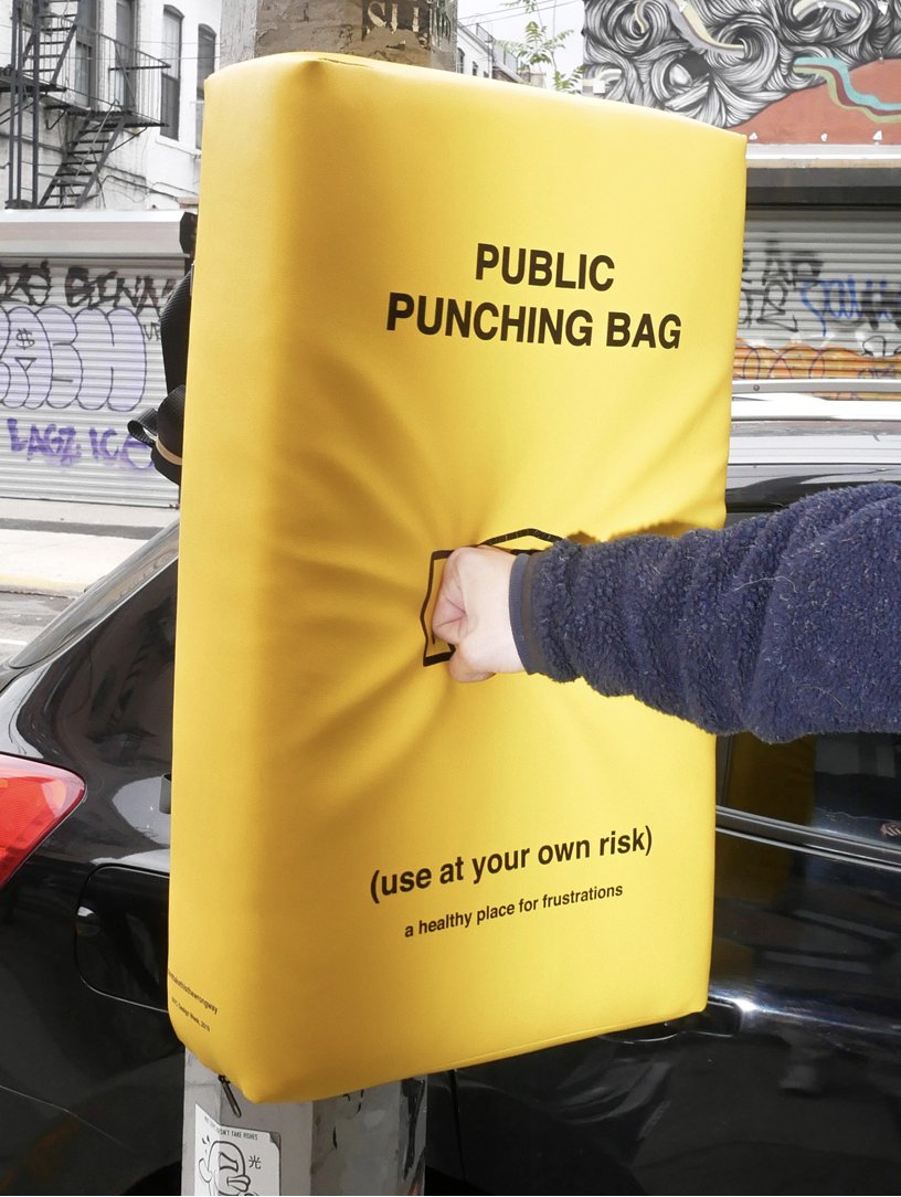 US-based design studio donttakethisthewrongway (dtttww) installed bright yellow punching bags on the streets of New York City during this year's  NYCxDESIGN to help passers by to release their frustrations donttakethisthewrongway.com