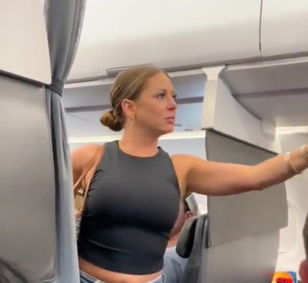 PopCrave's tweet photo. “Crazy plane lady” addresses conspiracy theories surrounding her viral outburst in @PardonMyTake interview: 

“I did not see anything…I got in a bit of an altercation, it spiraled out of control. It was not my best moment…absolutely mortifying. ‘That motherf**kers not real’ is an expression of speech. DailyMail was making me look batsh*t, and I did look absolutely crazy. But I was just in my feels - there was just a really bad energy.”