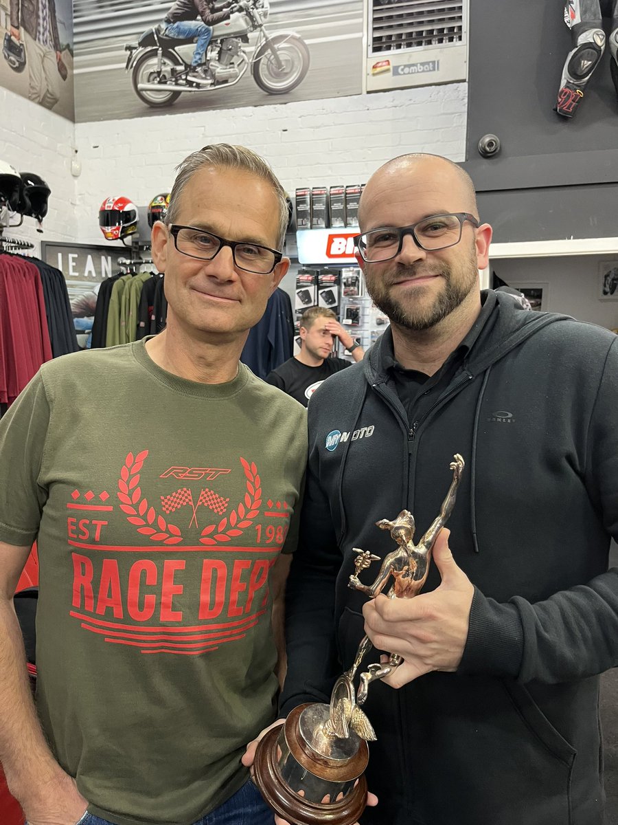 SimonB0922's tweet photo. Over a year ago we had an open evening at work and I was lucky enough to meet one of the legends of Motorcycle racing. @Jimwhit69 thanks for the pic and a top night at @MotoManchester @DstoreManc https://t.co/MsdGAcuw2f