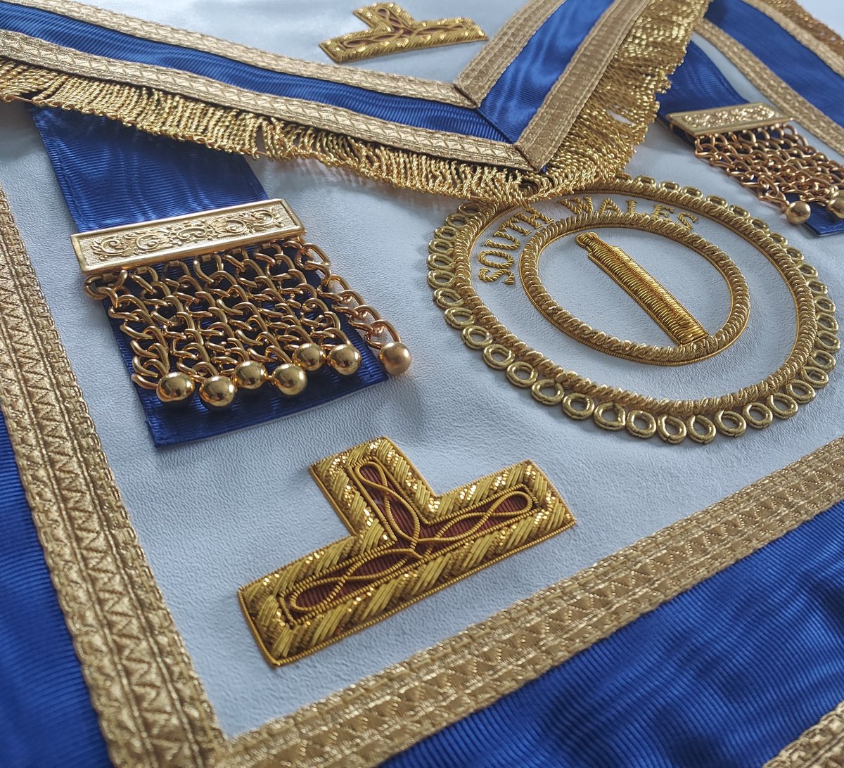 I have uploaded photos of our New Bespoke Aprons which are Unique and a little bit Special, these can be made for every order Craft, Royal Arch, Mark etc. They are made from the Finest Leather with Bullion Metal Fringes; all Embroidery is stitched directly onto Apron.