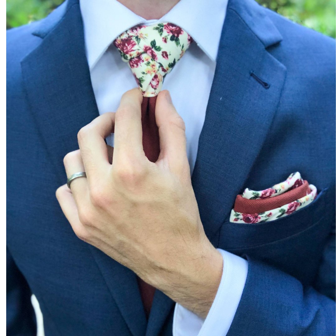 Floral Whispers at Every Knot: Our Duality Bloom Men's Tie whispers a floral secret, revealing your unique style when you turn heads. Get ready to make a statement! 🌼 #ties #tie #necktie #neckties #floralties #floraltie #weddingtie #weddingties #burgundytie #groomsmentie #grooms