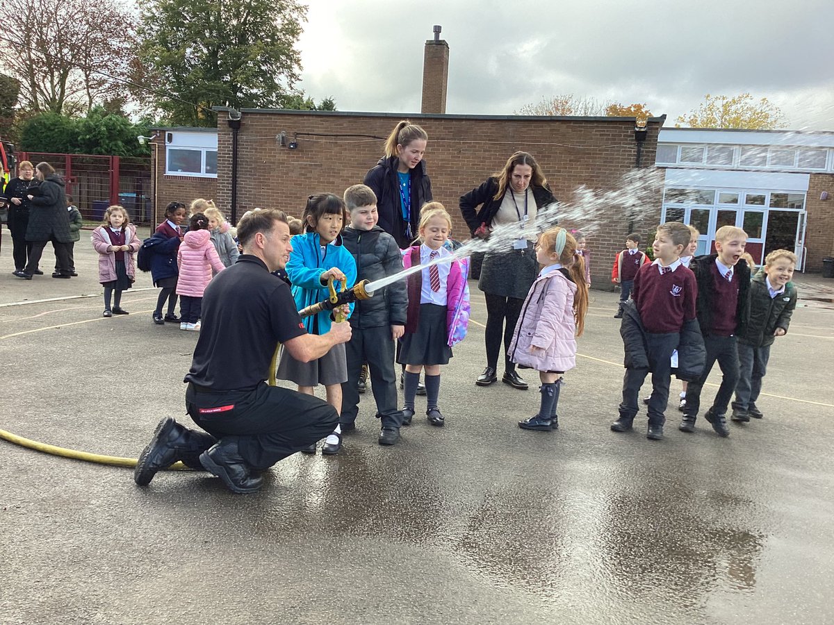annes_school's tweet photo. Just before half term, Miss Evans arranged a visit for Year 2 from @StaffsFire. This was to link to our history learning about the Great Fire of London and our vehicle ‘How can I keep safe?’ The children got to go inside the fire engine and even squirt the hose! 🔥 https://t.co/QrcqMNI7yt