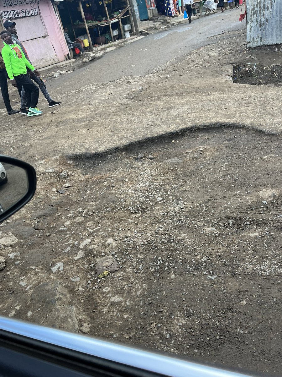 D_Bobozz's tweet photo. This pothole is causing a menace increasingly every day. It is at the corner of C&amp; R Food industries boundary wall.  @OuteringRoadKE @KURAroads @HEBabuOwino @KeNHAKenya @Ma3Route @TransportKE @ntsa_kenya https://t.co/eggb5WoYo4