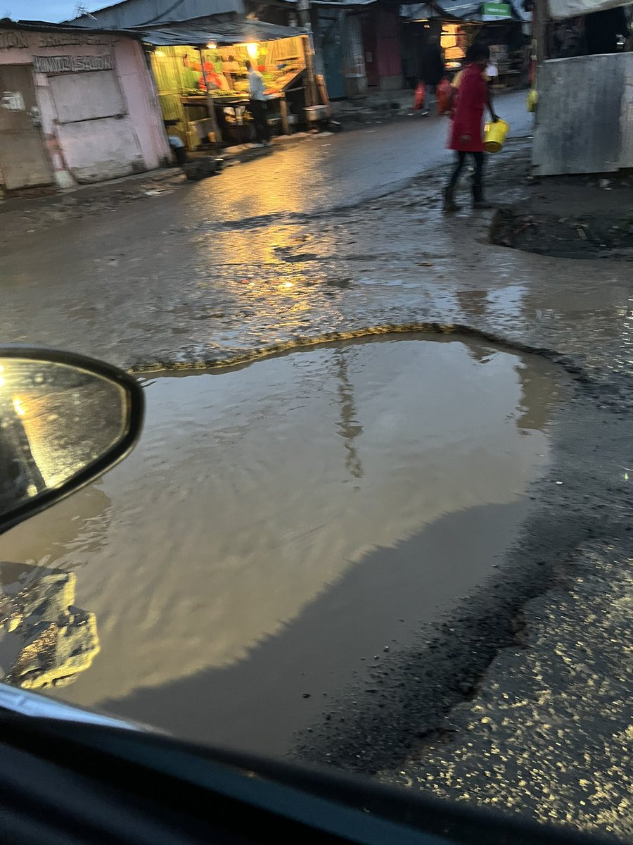 D_Bobozz's tweet photo. This pothole is causing a menace increasingly every day. It is at the corner of C&amp; R Food industries boundary wall.  @OuteringRoadKE @KURAroads @HEBabuOwino @KeNHAKenya @Ma3Route @TransportKE @ntsa_kenya https://t.co/eggb5WoYo4