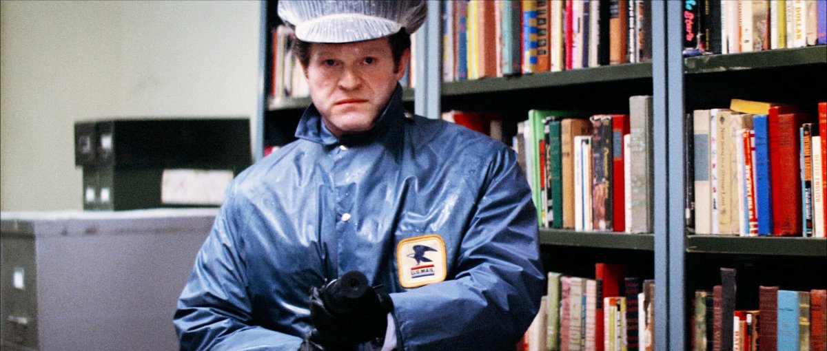 "Detached Service: CIA." <a href="/MrHankGarrett/">Hank Garrett</a> as the Mailman in THREE DAYS OF THE CONDOR (1975).
