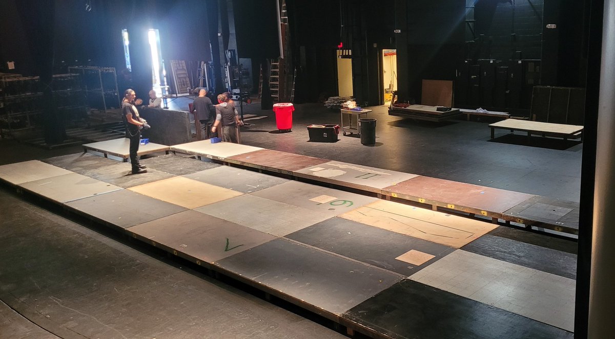 nthutch's tweet image. Deck going down. Legs on all those platforms. Tech tables installed.

#lifeofaproductionmanager #theatre #loadin