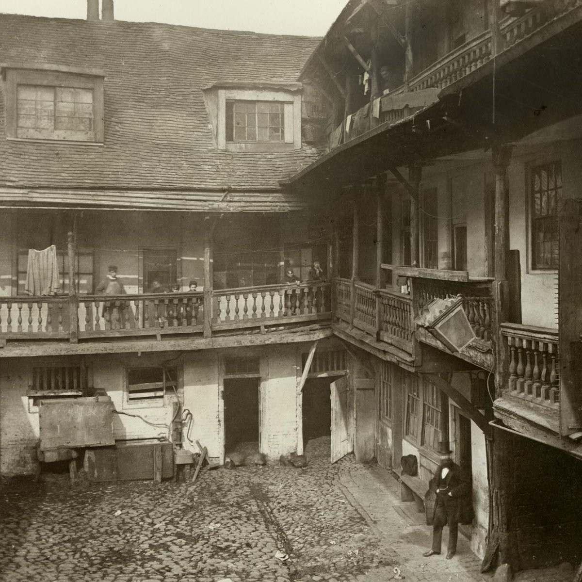The Oxford Arms Inn in London was originally built in the 16th century and rebuilt following the Great Fire of 1666. It was still occupied when photographed here in 1875 but was threatened by demolition.

It was pulled down three years later, making way for a range of new houses.